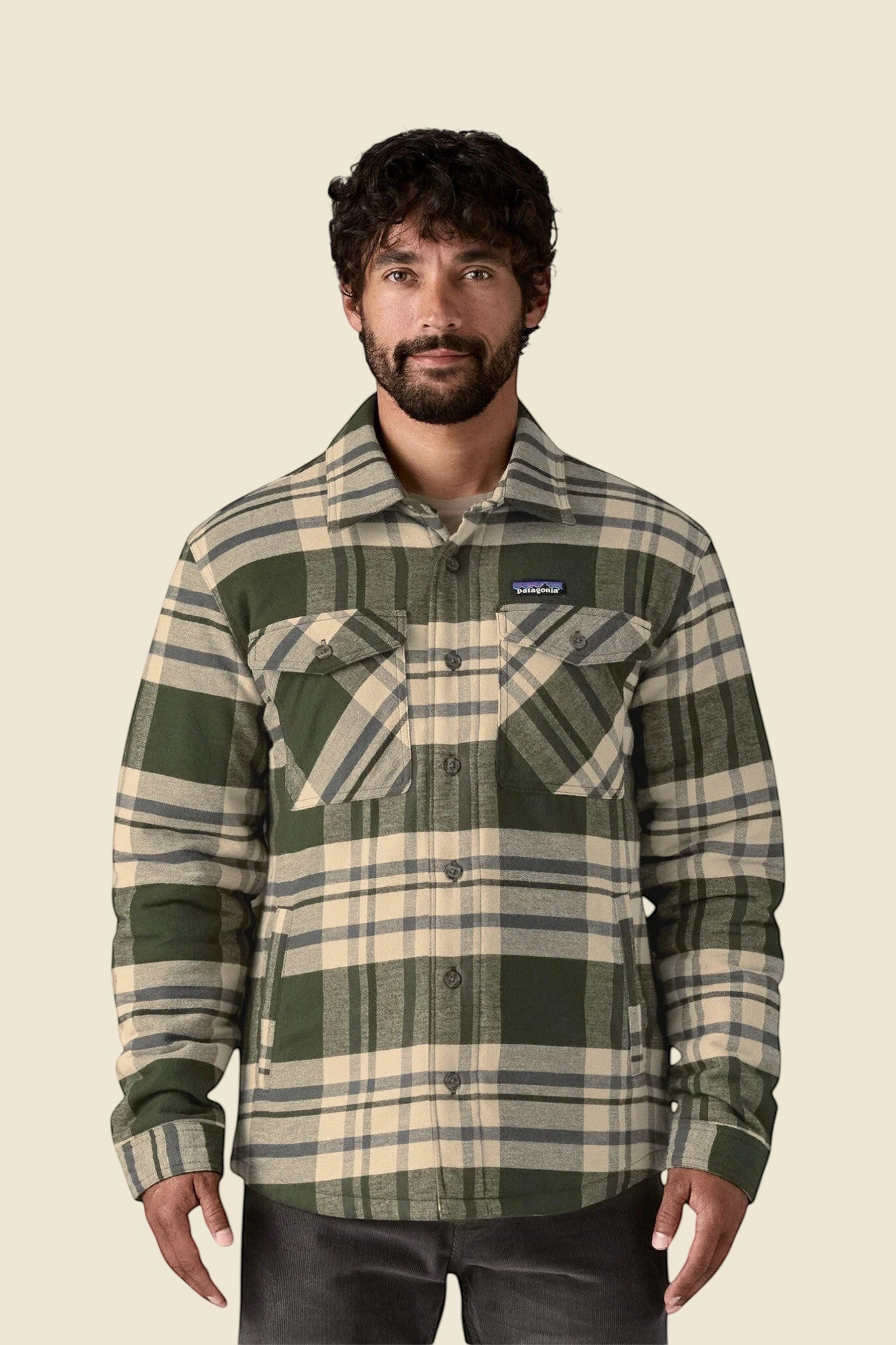 Keel Surf & Supply men's green and beige plaid insulated flannel shirt with chest pockets.
