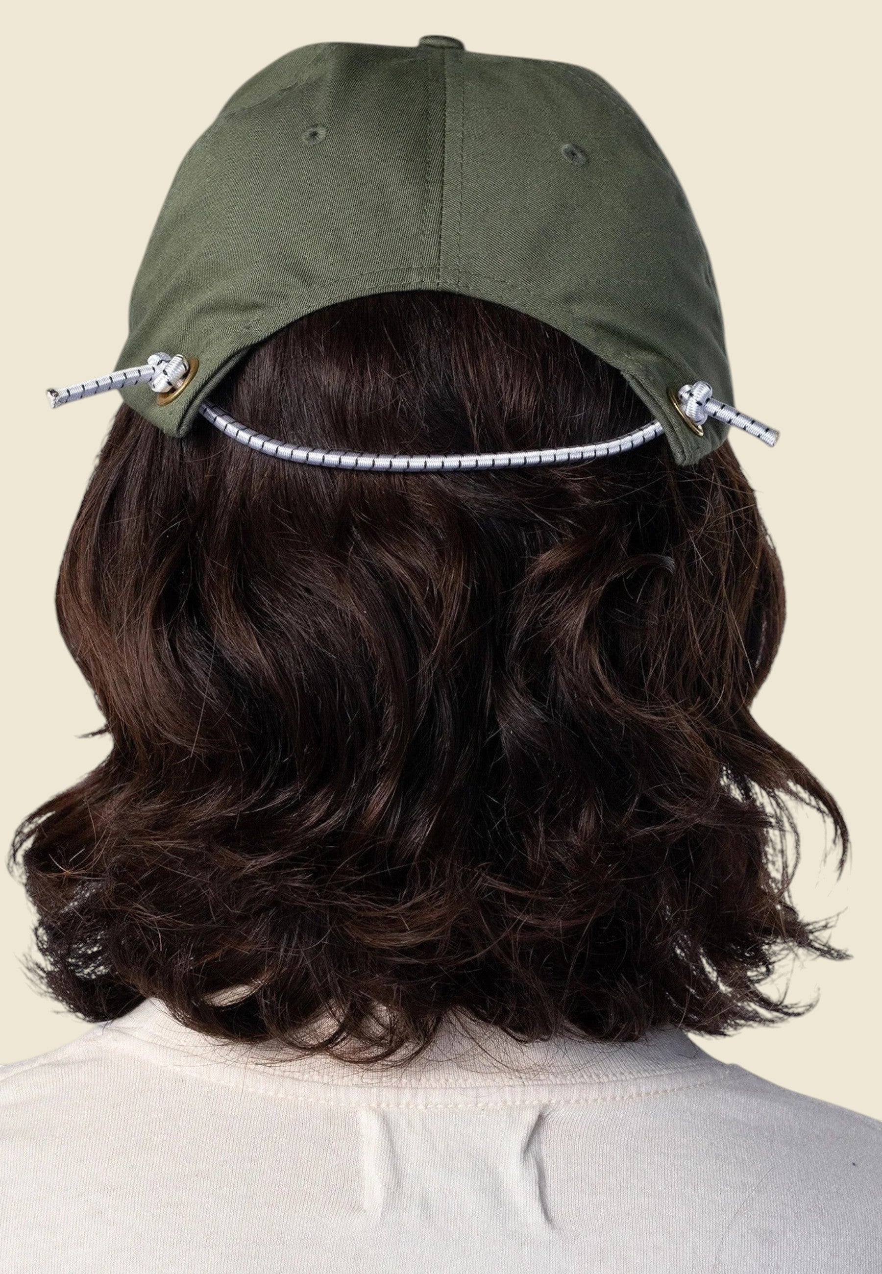 Keel Surf & Supply drab green cotton-polyester baseball cap with bungee closure and embroidered logo.