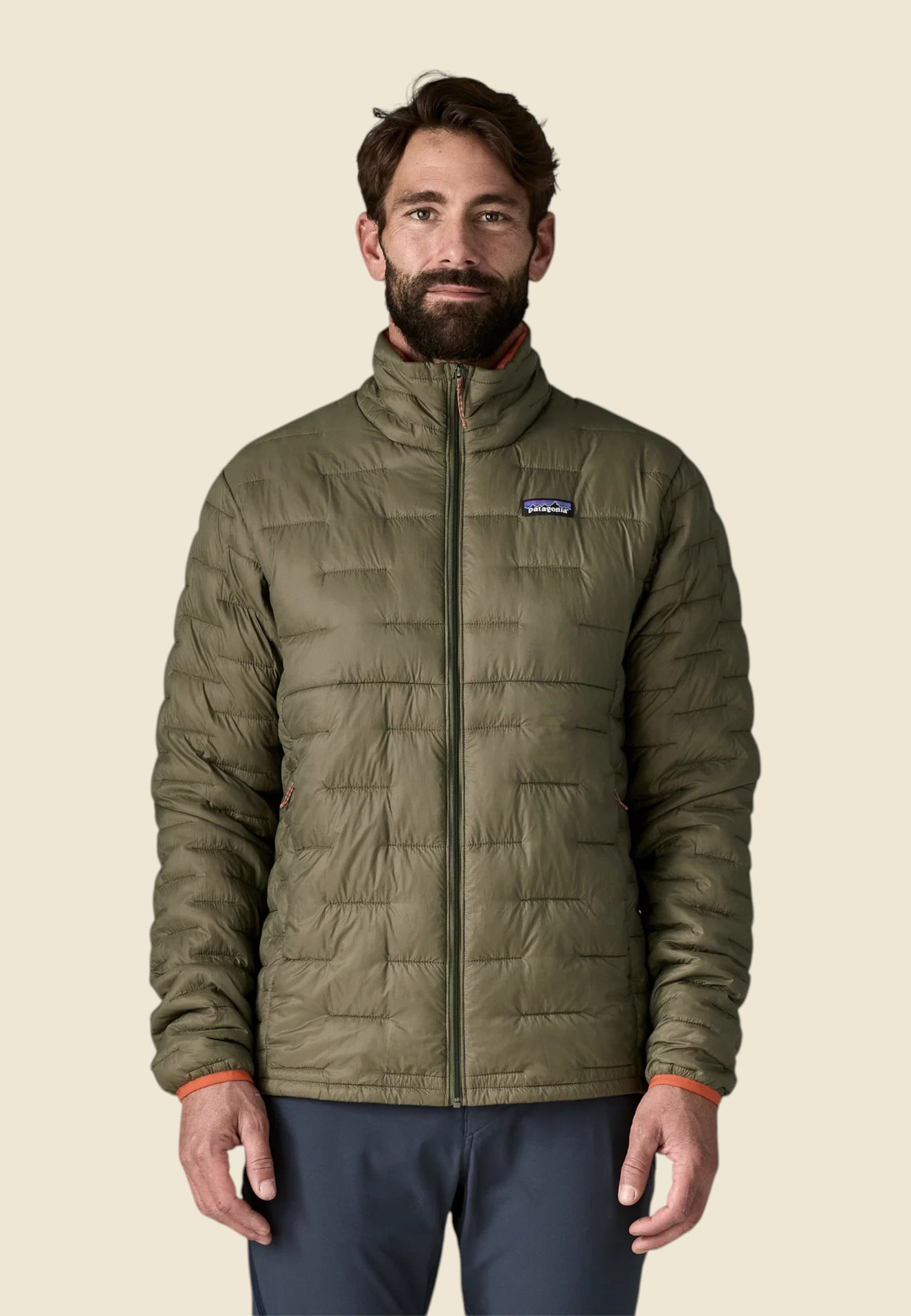 Keel Surf & Supply Men's Micro Puff Jacket in basin green. Lightweight, water-resistant ripstop nylon with PlumaFill insulation. Full-zip, zippered pockets.