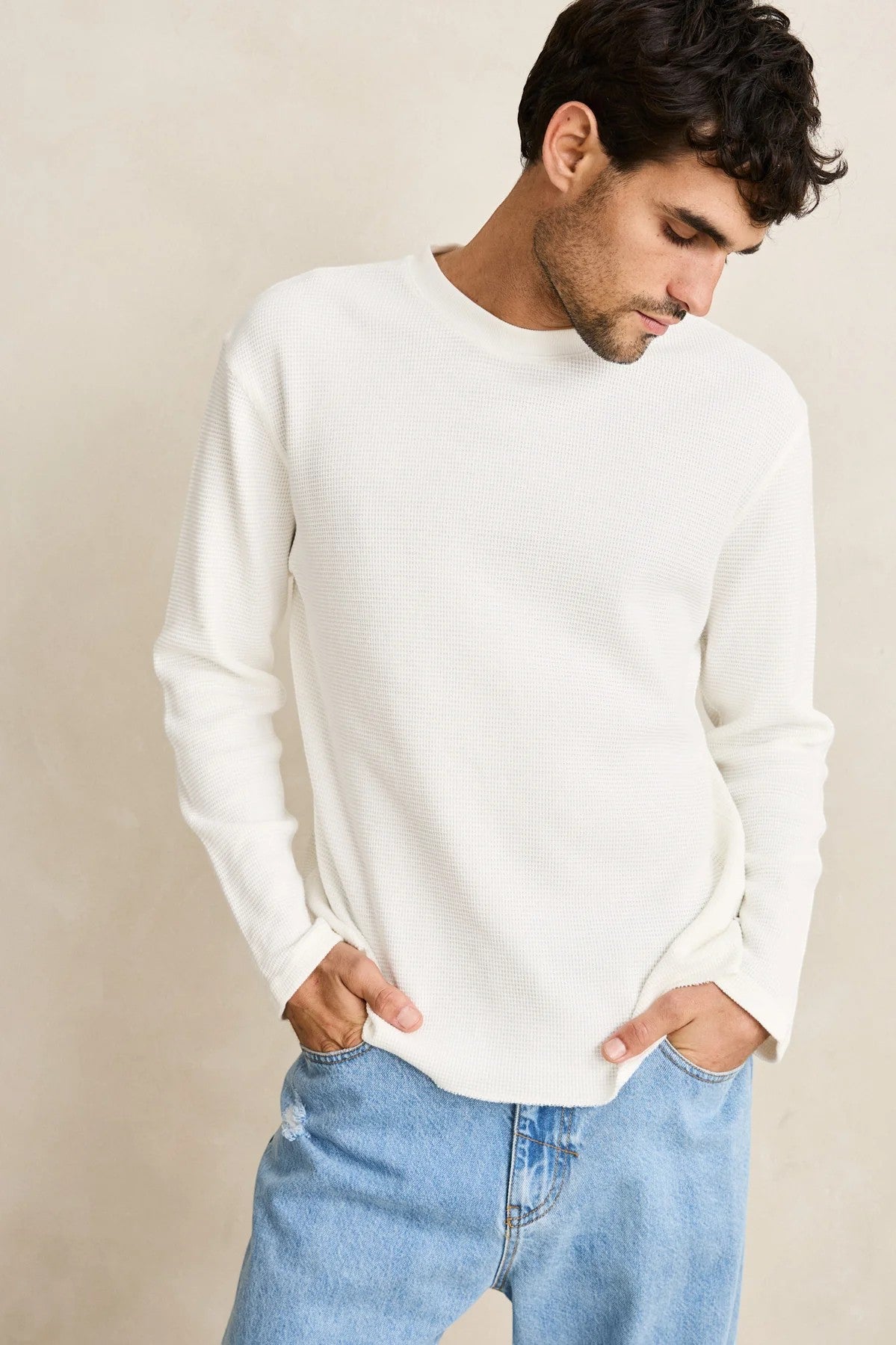Keel Surf & Supply men's vintage white waffle knit long sleeve shirt, cotton blend, crew neck, relaxed fit, styled with light wash jeans.