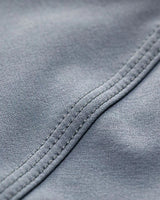 Close-up of gray fabric with stitching detail
