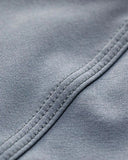Close-up of gray fabric with stitching detail