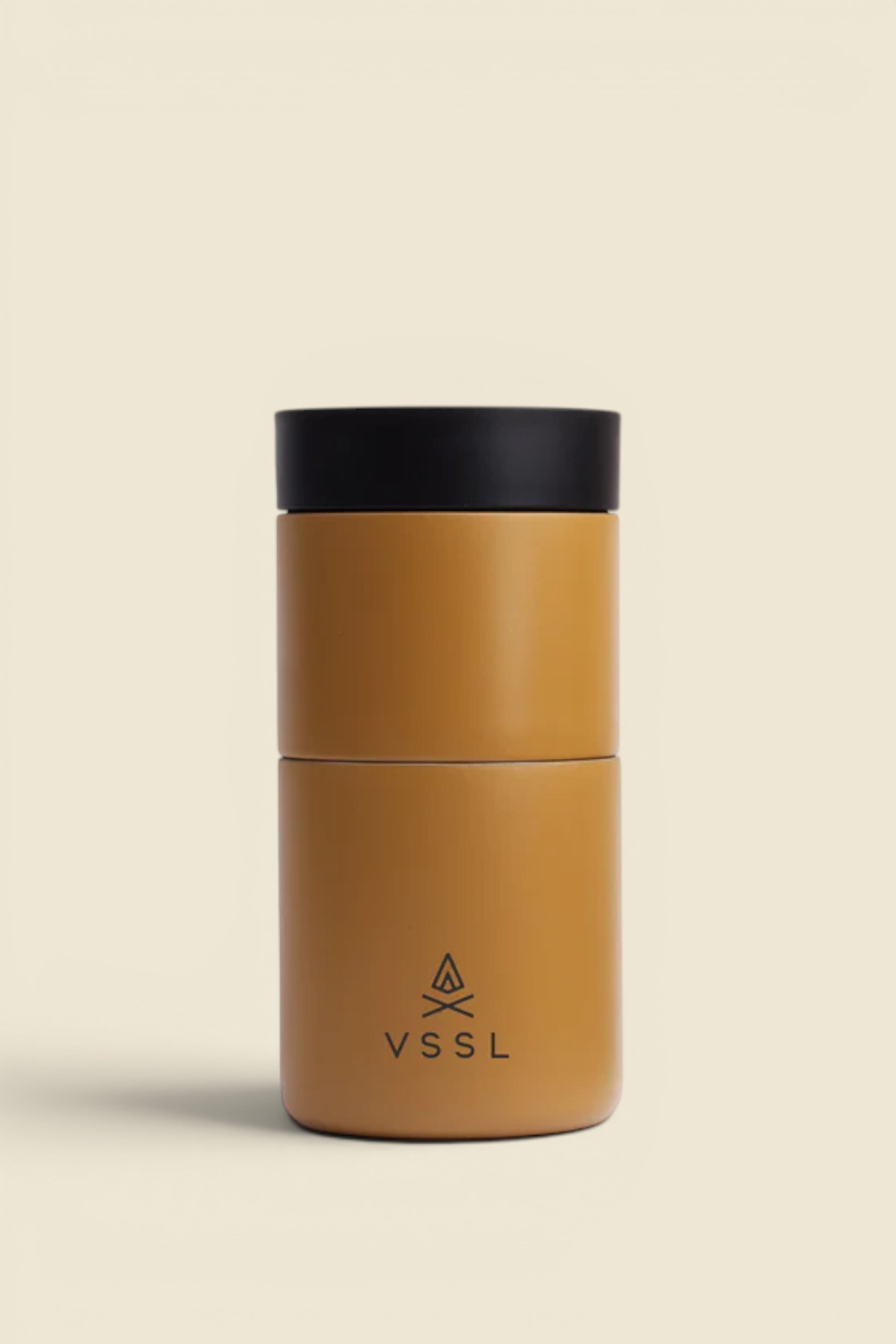 Keel Surf & Supply Nest Pour Over Coffee Set in Sahara, a compact, stackable stainless steel brewing system with a black lid, ideal for travel.