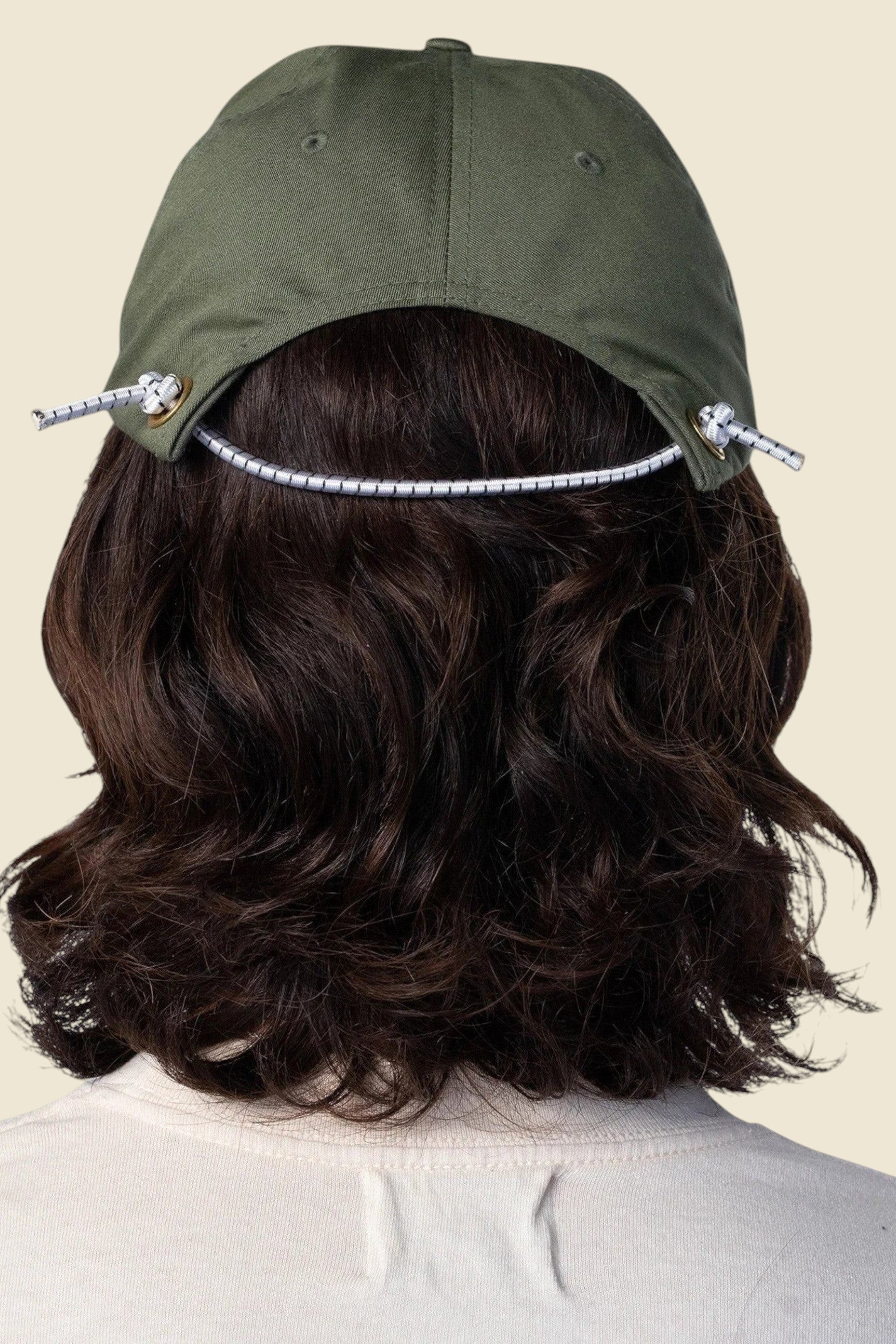 Keel Surf & Supply drab green cotton-polyester baseball cap with bungee closure and embroidered logo.