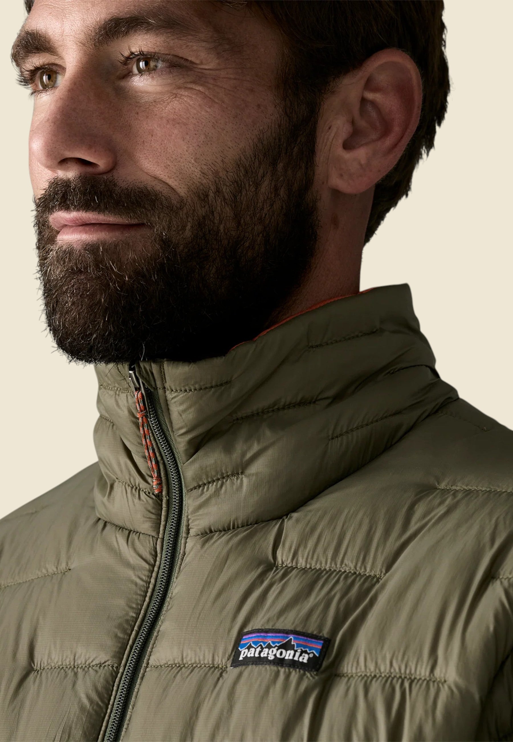 Keel Surf & Supply Men's Micro Puff Jacket in Basin Green. Lightweight, water-resistant ripstop nylon with PlumaFill insulation.