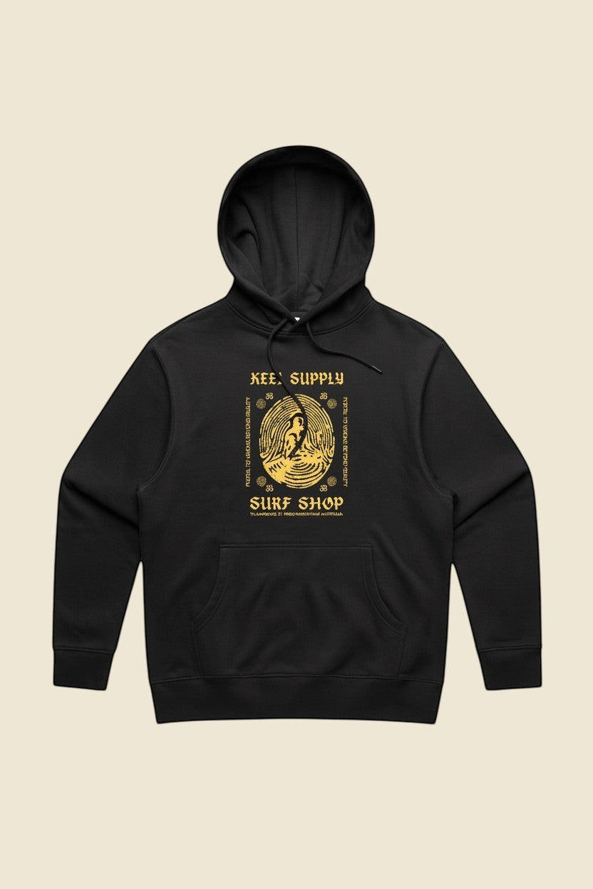 Keel Surf & Supply black cotton blend hoodie with gold meditation graphic and text.