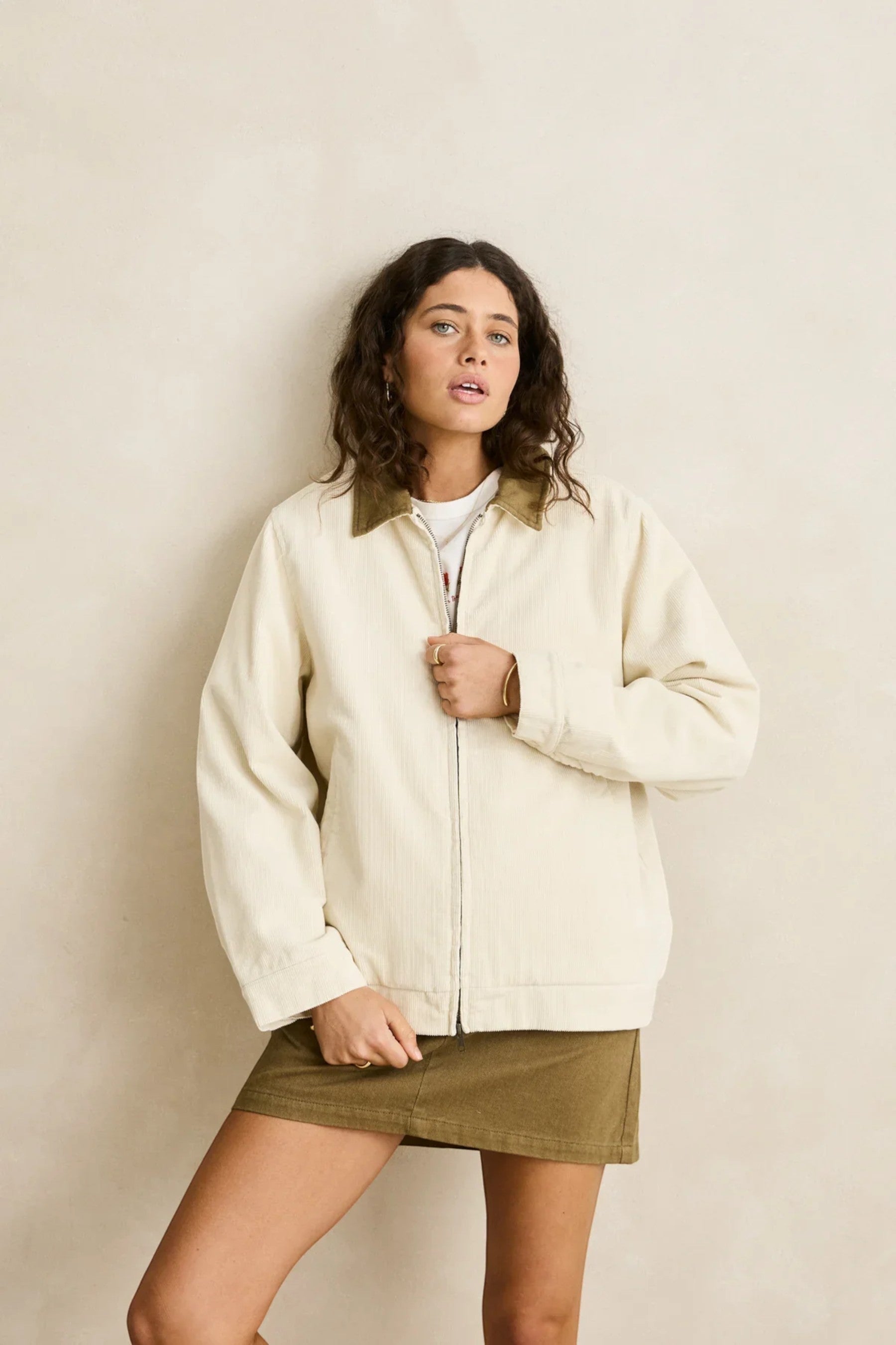 Keel Surf & Supply Jamie Jacket: cream corduroy jacket with olive green collar and zip closure.