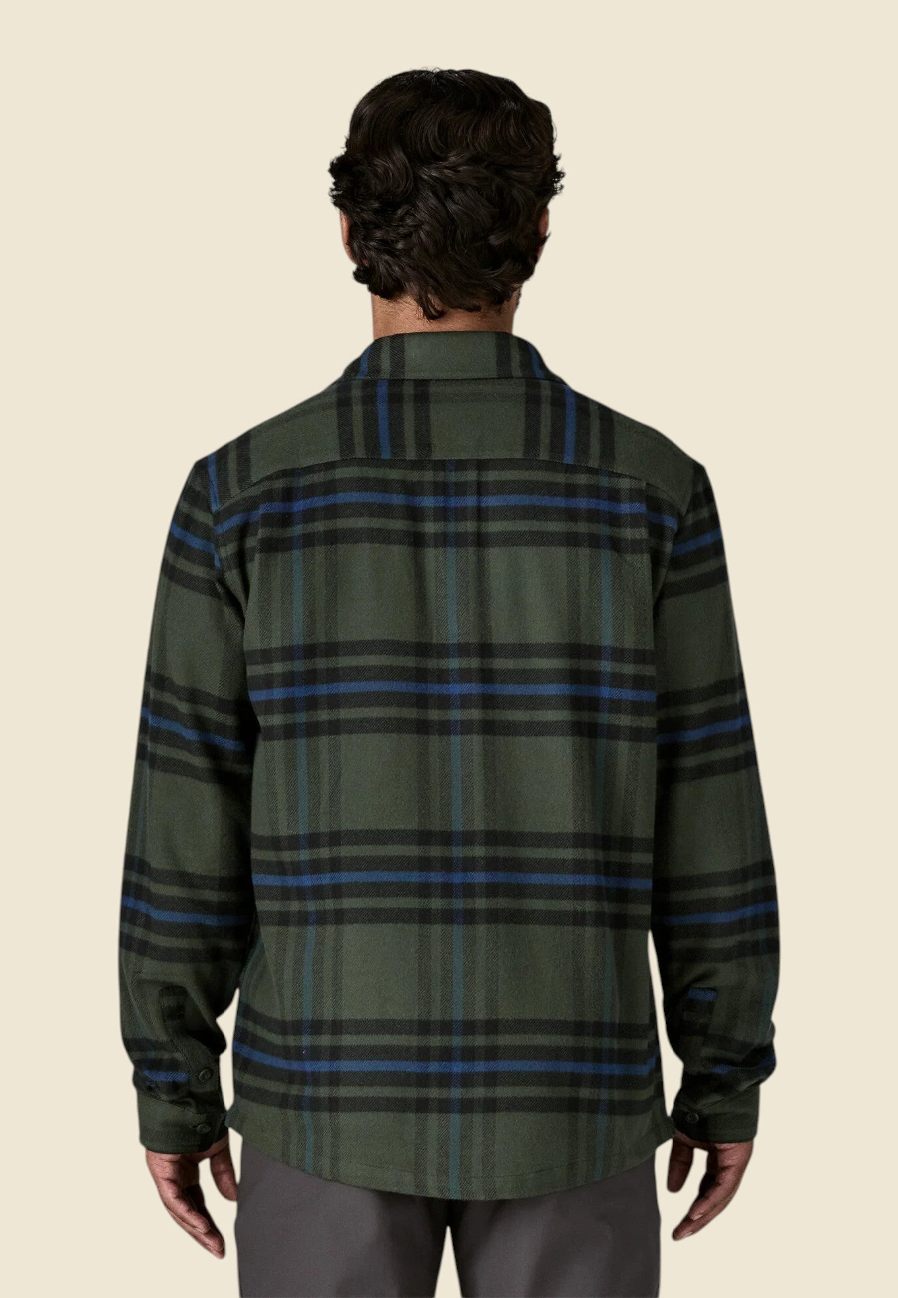 Keel Surf & Supply Men's Fjord Flannel Shirt in green with blue and black plaid, made from 100% organic cotton.