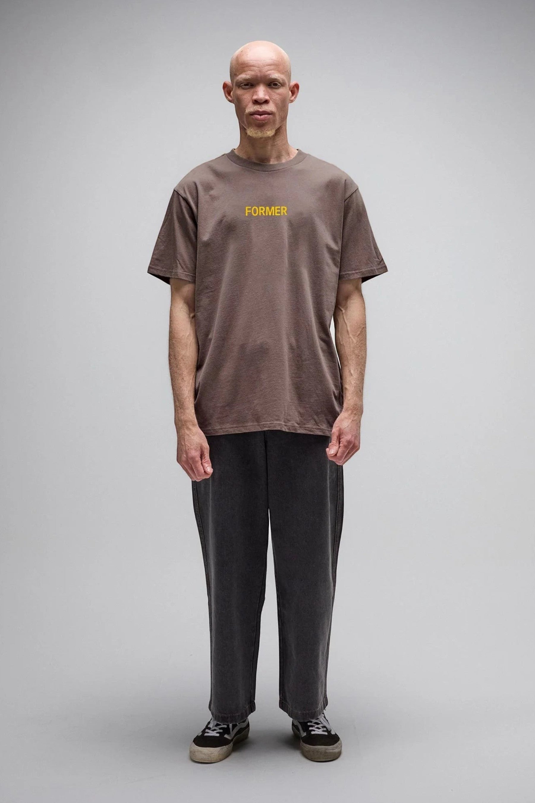 Keel Surf & Supply washed brown cotton jersey t-shirt with yellow 'FORMER' logo graphic on chest, standard fit.